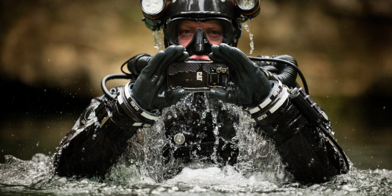 Cave diver Andy Torbett using a Cat S60 to explore the depths