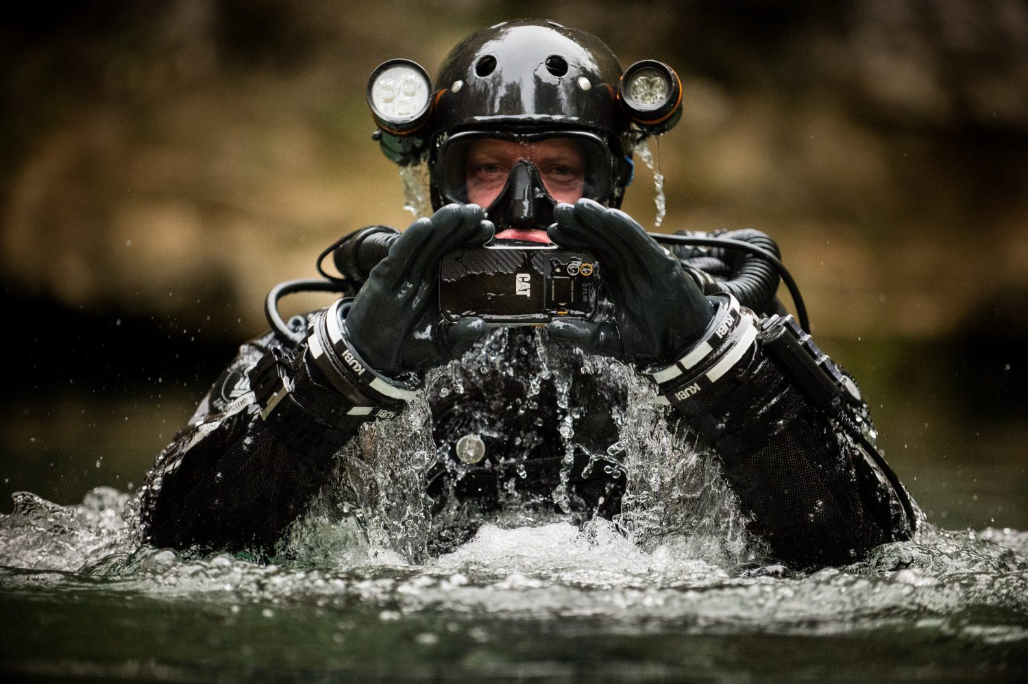 Cave diver Andy Torbett using a Cat S60 to explore the depths